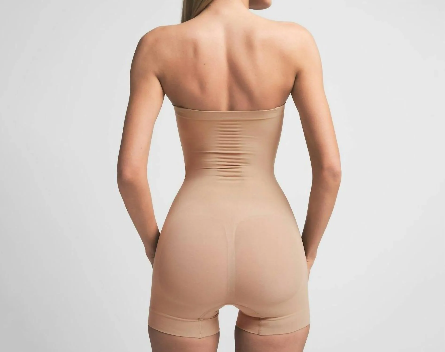 Seamless Sculpt Strapless Shortie Bodysuit In Clay